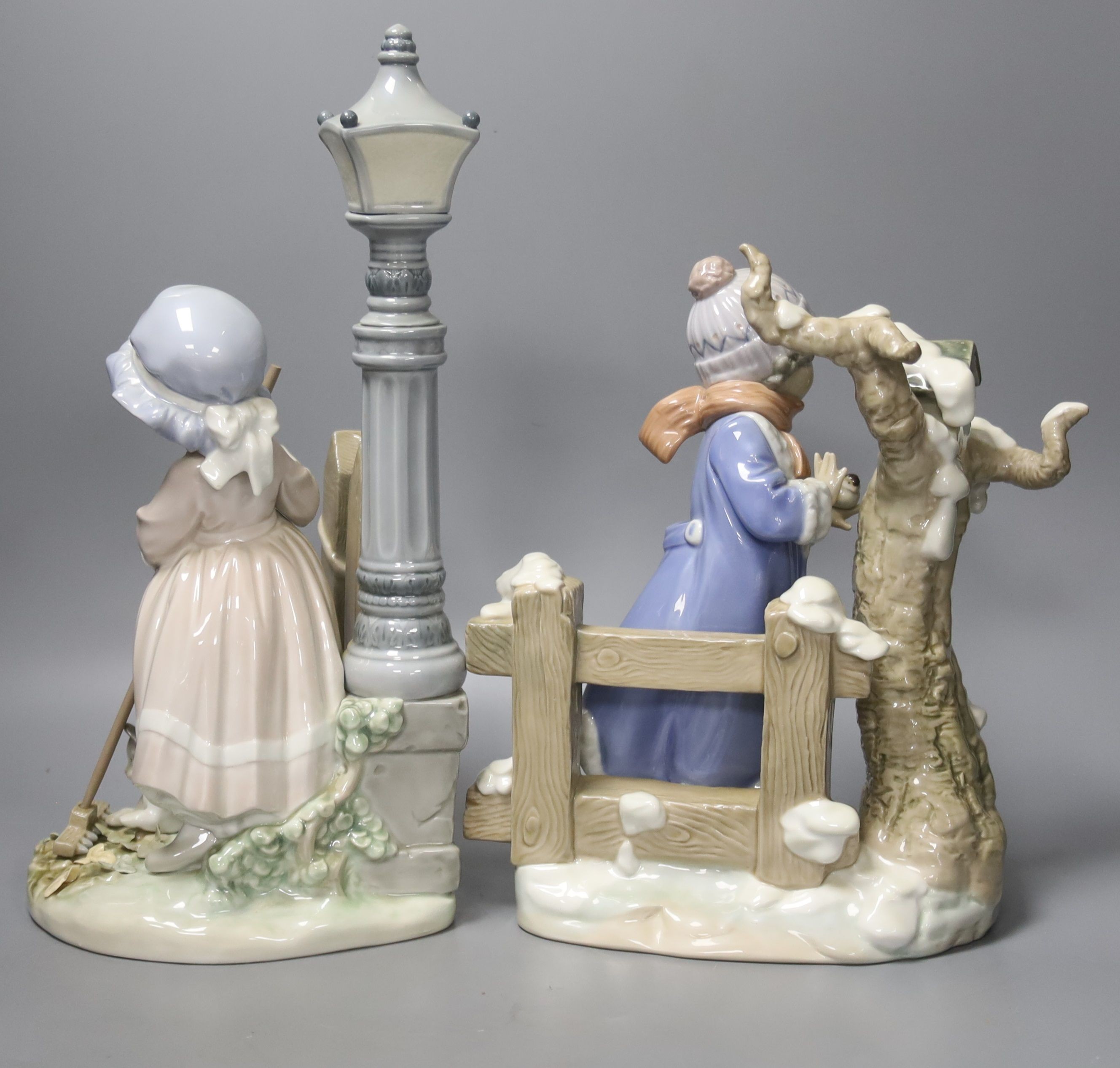 Two large Lladro models of children, 'Autumn' and 'Winter', height 32cm